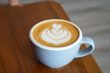 Cafe Latte with Oat Milk, Indonesia, captured on August 6, 2025. A warm oat milk latte served in a ceramic cup, creamy and smooth, perfect for a cozy café moment with natural light on a wooden table