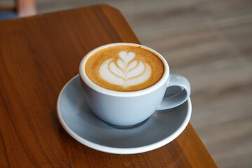 Cafe Latte with Oat Milk, Indonesia, captured on August 6, 2025. A warm oat milk latte served in a ceramic cup, creamy and smooth, perfect for a cozy café moment with natural light on a wooden table