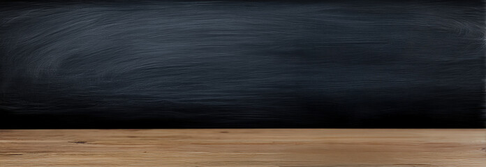 Empty blackboard set against a rustic wooden table, creating a perfect backdrop for the upcoming back to school season