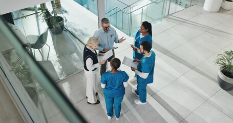 People, nurse and meeting in lobby at hospital for planning, medical report and surgery schedule....