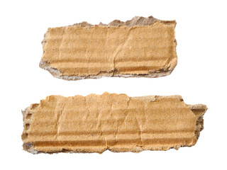 Pieces of torn or cut brown cardboard isolated design element on transparent background.