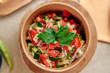 A Vibrant Salad Bowl Featuring Fresh Vegetables and Herbs, Perfect for a Healthy Meal or Side Dish, Combining Colorful Ingredients for a Nourishing Experience