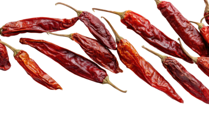 Dried red chilies arranged on a white isolated background, perfect for culinary use or food photography.
