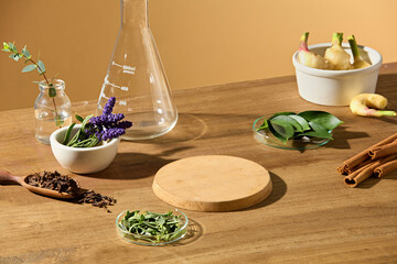Top-down view featuring turmeric, cinnamon sticks, lavender, and greenery around a round wooden stand. The center is left empty, offering a layout for showcasing essential oils or herbal cosmetics.