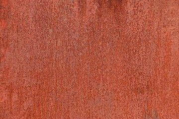 Background, texture metal surface covered with a thick layer of rust