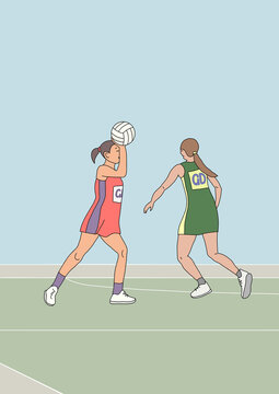 Two women in action on netball court on game day