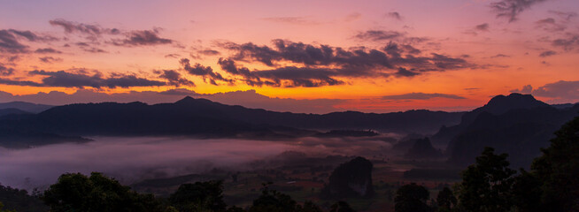 Fototapeta premium Banner purple sky sunrise dramatic beautiful landscape view. Dawn sky violet pink gold dusk time cloudscape with sunlight. Panorama Dramatic vibrant sunset scenic landscape nature with copy space