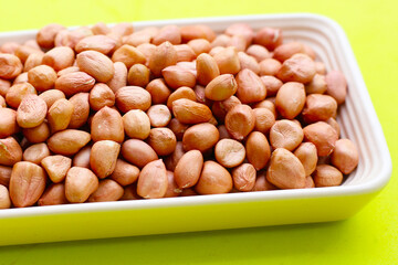 Raw peanuts with red skin