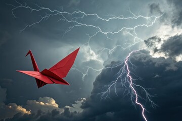 Red origami crane flying through stormy lightning weather sky