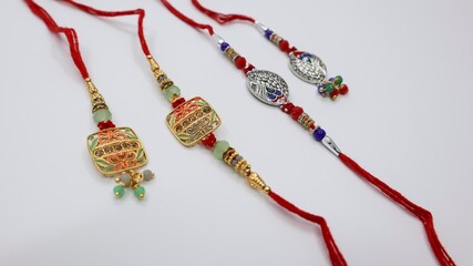 Rakhi pair with Rakshabandhan with red thread 