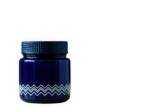 Small blue glass jar with white zigzag pattern isolated on transparent background