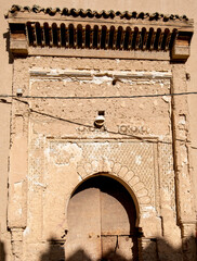 Rissani - detail of gate in the walls of Ksar Ouled Abdelhalim fortified village. Morocco,  Erg Chebbi Sahara desert, North Africa
