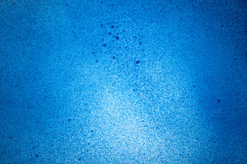 青色のスプレー塗料で塗った背景	