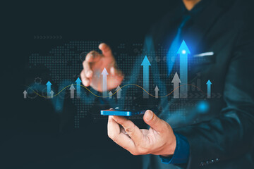 Businessman holding business growth graph, growth strategy and goal achievement with up arrow. Business strategy development and growth plan.