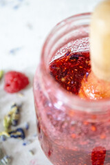 Rich Raspberry Syrup with Lavender and Pea Flower in Jar