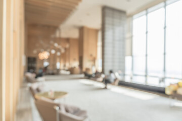 Blurred business office building lobby or hotel blur background interior view toward reception...