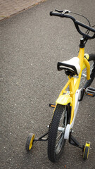 Fototapeta premium Children's bike with training wheels