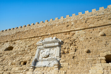 Detail of the famous symbol of Venice placed on the external entrance wall of the Venetian fortress in Heraklion. Crete, Greece.