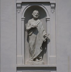 Poet statue on Ama church, Bergamo, Italy
