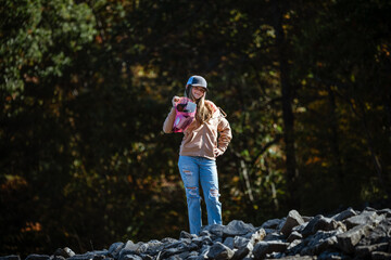 Teen picking up litter at state park in Missouri