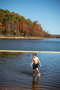 Boy wading in Lake Wappapello public swimming area