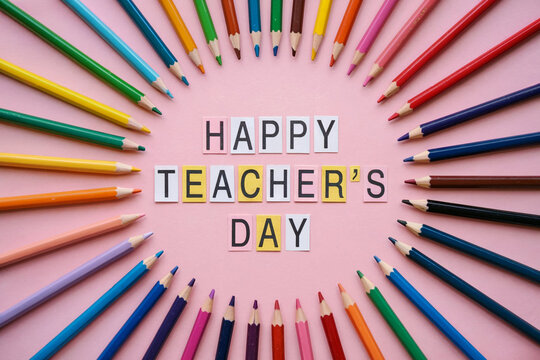 Happy Teacher's Day with Colorful Pencils on Pink Background for Classroom, Greeting Card, Education, or Celebration Design - Powered by Adobe