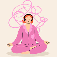 Woman in pink pajamas meditating with headphones on, listening to relaxing music. Calm and mindfulness concept.