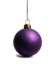 A vibrant purple Christmas ornament with a glitter finish hangs against a white background, This image is ideal for holiday decoration themes, seasonal marketing, or festive greeting cards,