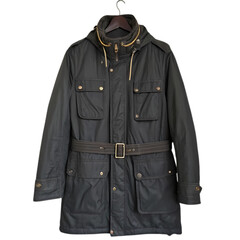 Naklejka premium Men's Black Winter Parka Jacket: Warm, Stylish, & Functional Outerwear