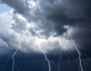Dramatic low-angle view of lightning striking through dark storm clouds