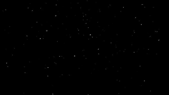White dust particles floating in the dark. Atmospheric video with soft motion, ideal for overlays, transitions, or creating vintage or dreamy effects.