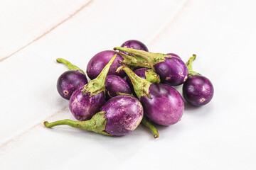 Small organic young purple round eggplant
