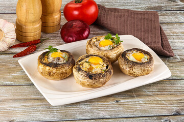 Baked champignon with quail egg
