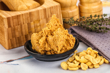 Crunchy peanut butter fat product