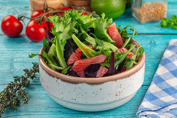 Salad with salmon and arugula