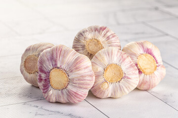 Raw young garlic bulb heap