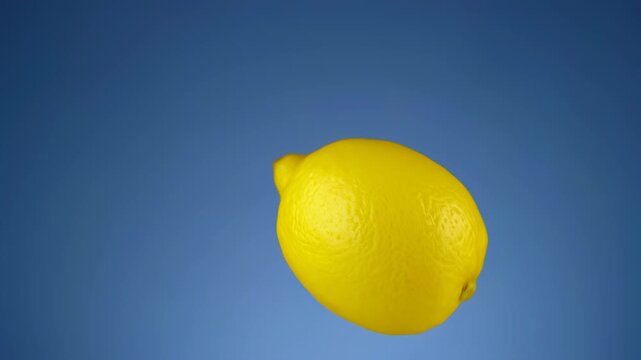Bright vivid yellow object against deep blue background