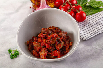 Roasted chicken hearts with vegetables
