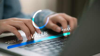 Close-up hands typing on laptop keyboard with virtual slider showing value adjustment from minimum to maximum. Concept of digital optimization, performance, and efficiency.