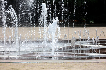 A fountain with many jets of water shooting up into the air