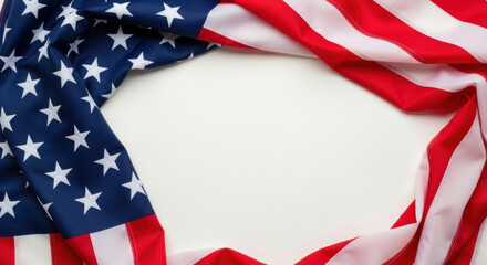 Obraz premium Close up of the american flag draped to create a frame with a blank white space for text