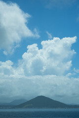 Summer Sky Over a Volcanic Island