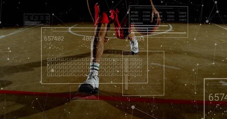 Male athlete whipping basketball between legs on court ball contact activating analytics panels - Powered by Adobe