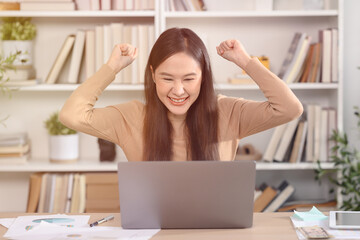A woman is working on her day off at home.