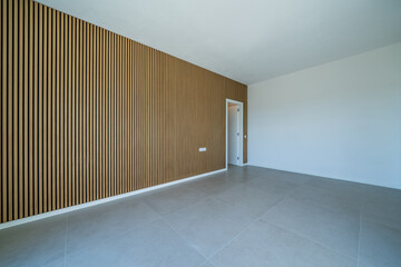 Room with wooden wall texture with wood acoustic panels pattern