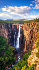 Majestic waterfall cascading down red rock cliffs