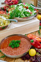 A Vibrant Spread of Fresh Salads and Sauces Showcasing Colorful Ingredients and Flavors for a Delicious Culinary Experience