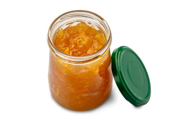 Orange marmalade in an open glass jar in top view with a green lid isolated