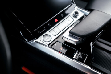 Naklejka premium Interior of a premium electric SUV, black leather, aluminum, decorative elements.