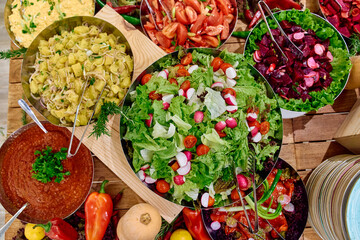 A Vibrant Display of Freshly Prepared Salads and Vegetables Showcasing a Colorful Array of Ingredients for a Healthy Eating Experience